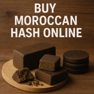moroccan hash bricks and coins on wooden board with crumbly piece and text “buy moroccan hash online”